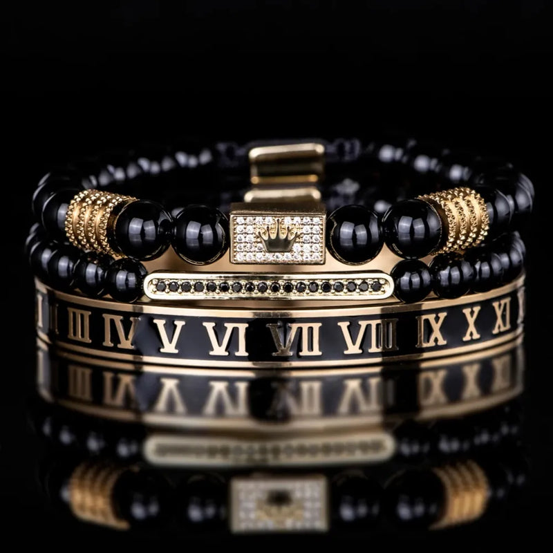 Crown Roman Bracelets – gold 3-piece bracelet set with Roman numeral bangle, 8mm beaded bracelets, and crown detail.