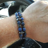 Blue Stone Skull Bracelet Set worn on wrist showing two stacked beaded bracelets