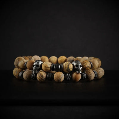 Two-piece Khaki Stone Skull Bracelet Set with natural stone beads and skull elements displayed on dark surface