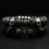 Lava Stone Skull Bracelet Set made with black volcanic beads and stainless-steel skull accents