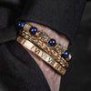 Leopard Emperor Bracelets – gold, black CZ stones, royal blue beads – worn on wrist