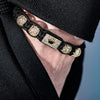 Men’s gold bracelet featuring crown detail