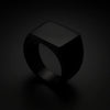 Black stainless steel signet ring with minimalist square face, matte finish, and masculine look